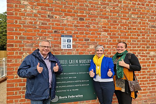 County Councillor Chris White alongside Daisy Cooper MP and Councillor Jacqui Taylor outside of Muriel Green Nursery 