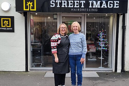 Susan Murray with employee outside of Street Image Hairdressing in Kirkintilloch.