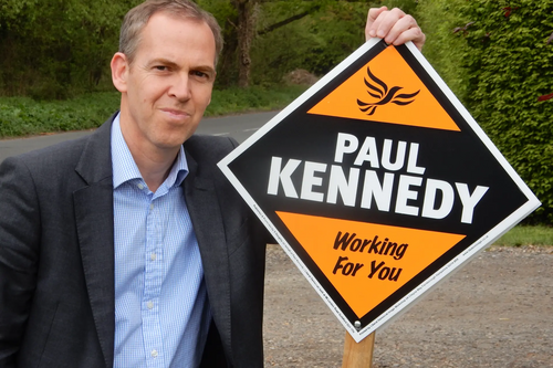 Paul Kennedy with Lib Dem stake board