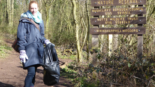 Annie Major litter picking in Sharphill Wood