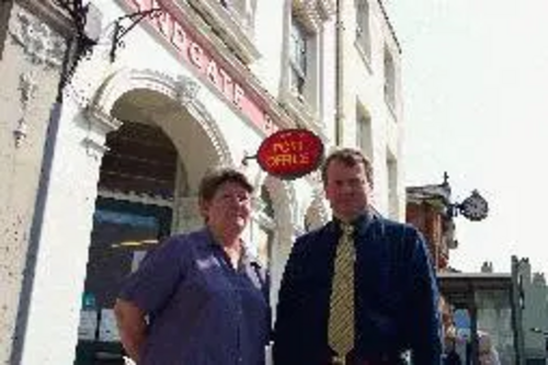 Peter Carroll and Linda Cufley outside Sandgate Post Office