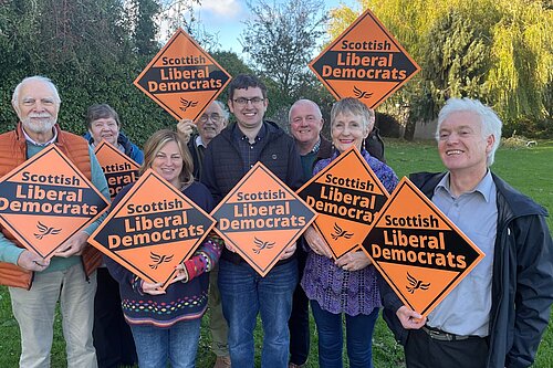 Grant Toghill in the centre of a group of Scottish Liberal Democrat campaigners.